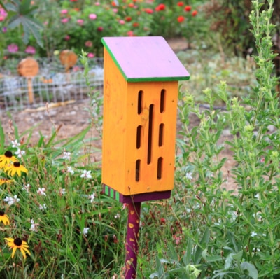 Putting up a butterfly house in your Monroe, NC garden is a great way to attract pollinators.